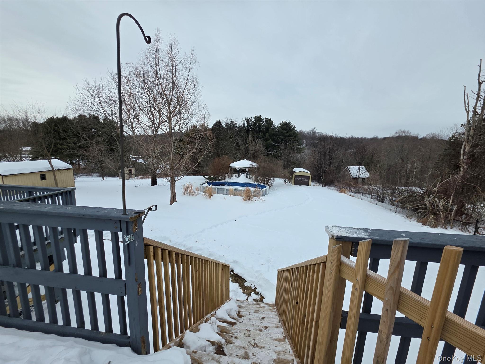 234 Prospect Road, Unit 2 Monroe, NY 10950 - Photo 3 of 19 a dinning table and chairs in the roof deck