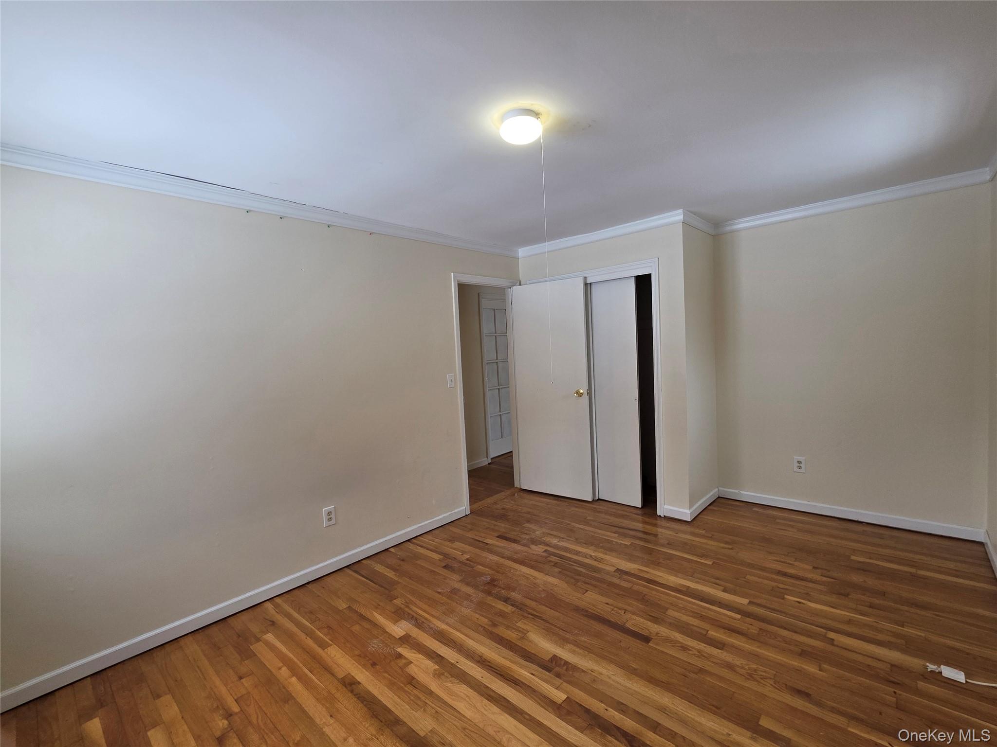 234 Prospect Road, Unit 2 Monroe, NY 10950 - Photo 8 of 19 a view of an empty room with wooden floor