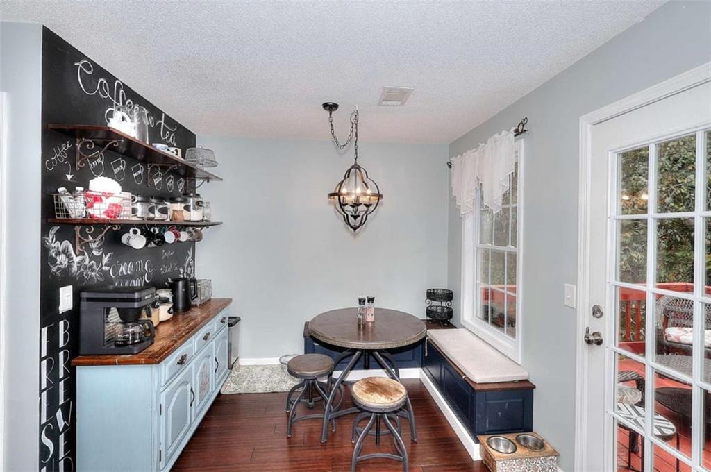 738 Worth Court Bethlehem, GA 30620 - Photo 16 of 43 a kitchen that has a table and chairs in it