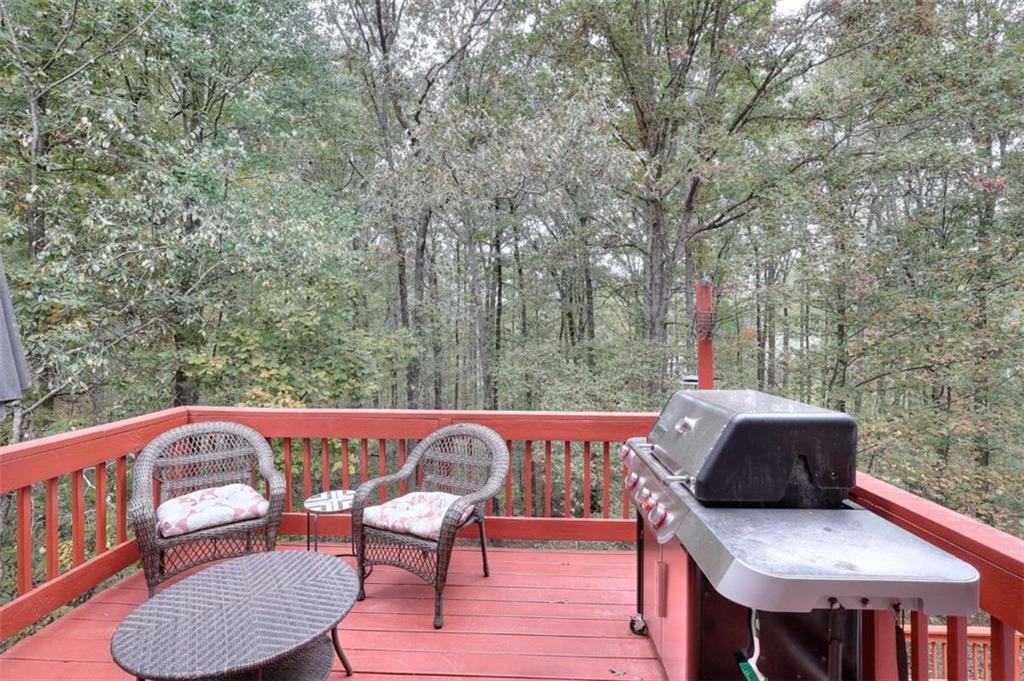 738 Worth Court Bethlehem, GA 30620 - Photo 17 of 43 a outdoor sitting area with furniture and wooden floor