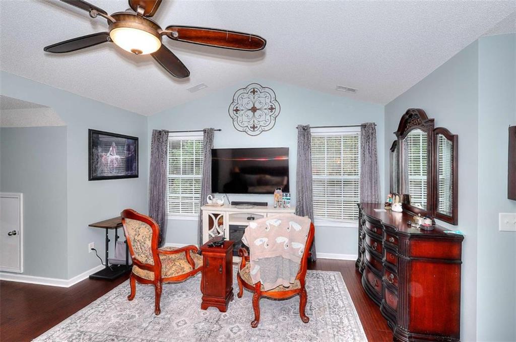 738 Worth Court Bethlehem, GA 30620 - Photo 28 of 43 a view of a livingroom with furniture and a flat screen tv