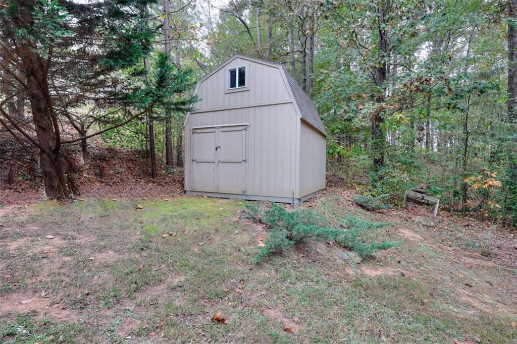 738 Worth Court Bethlehem, GA 30620 - Photo 32 of 43 a backyard of a house with lots of green space