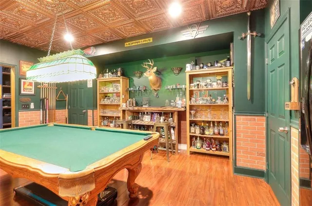 a room with lots of white furniture and window