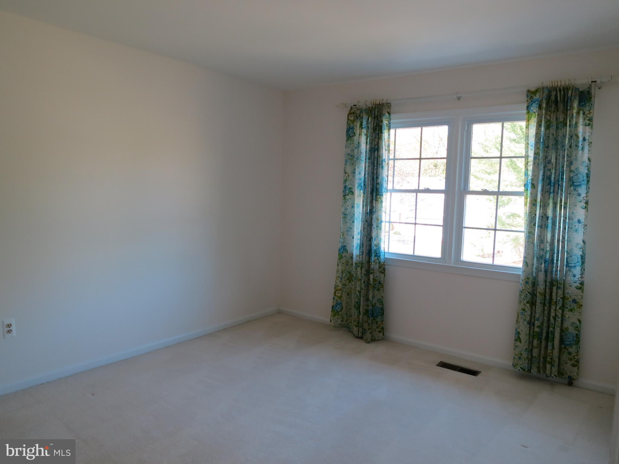 9156 Rockefeller Lane Springfield, VA 22153 - Photo 15 of 30 an empty room with windows