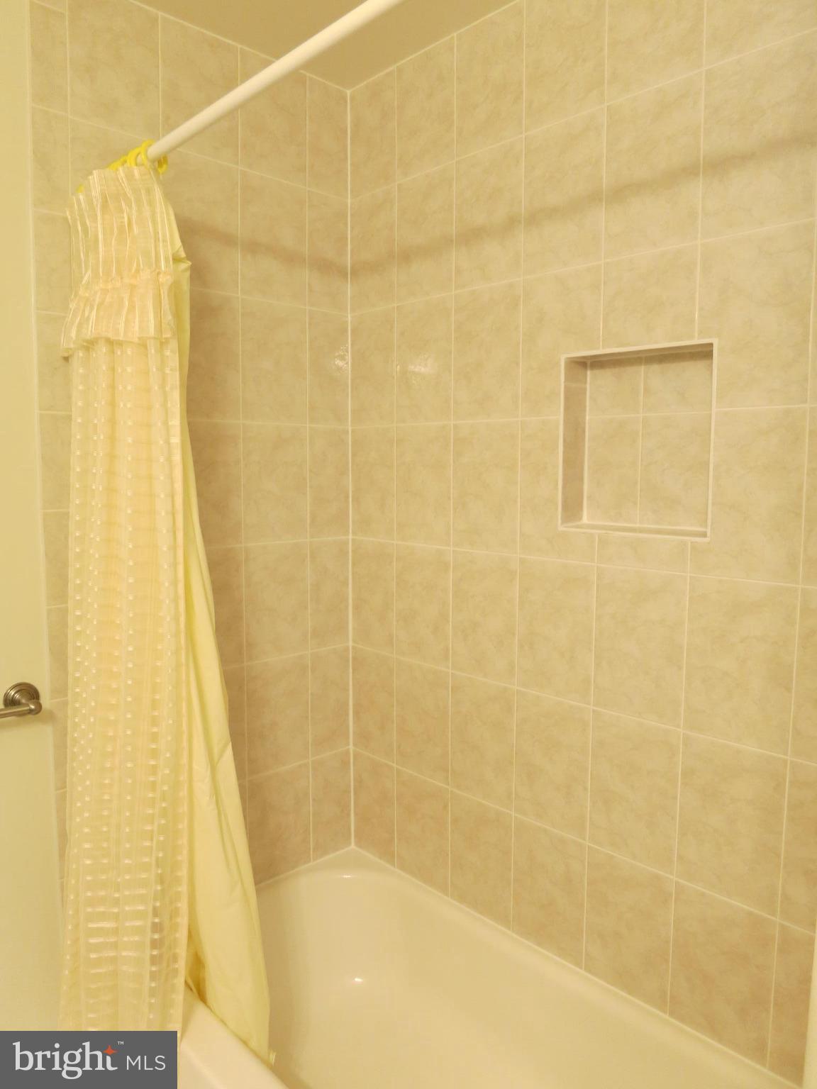 9156 Rockefeller Lane Springfield, VA 22153 - Photo 18 of 30 a bathroom with a shower