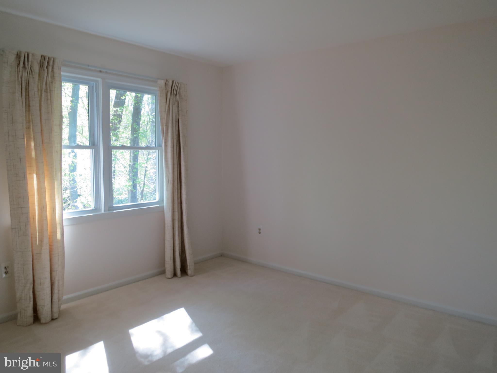 9156 Rockefeller Lane Springfield, VA 22153 - Photo 19 of 30 a view of empty room with window