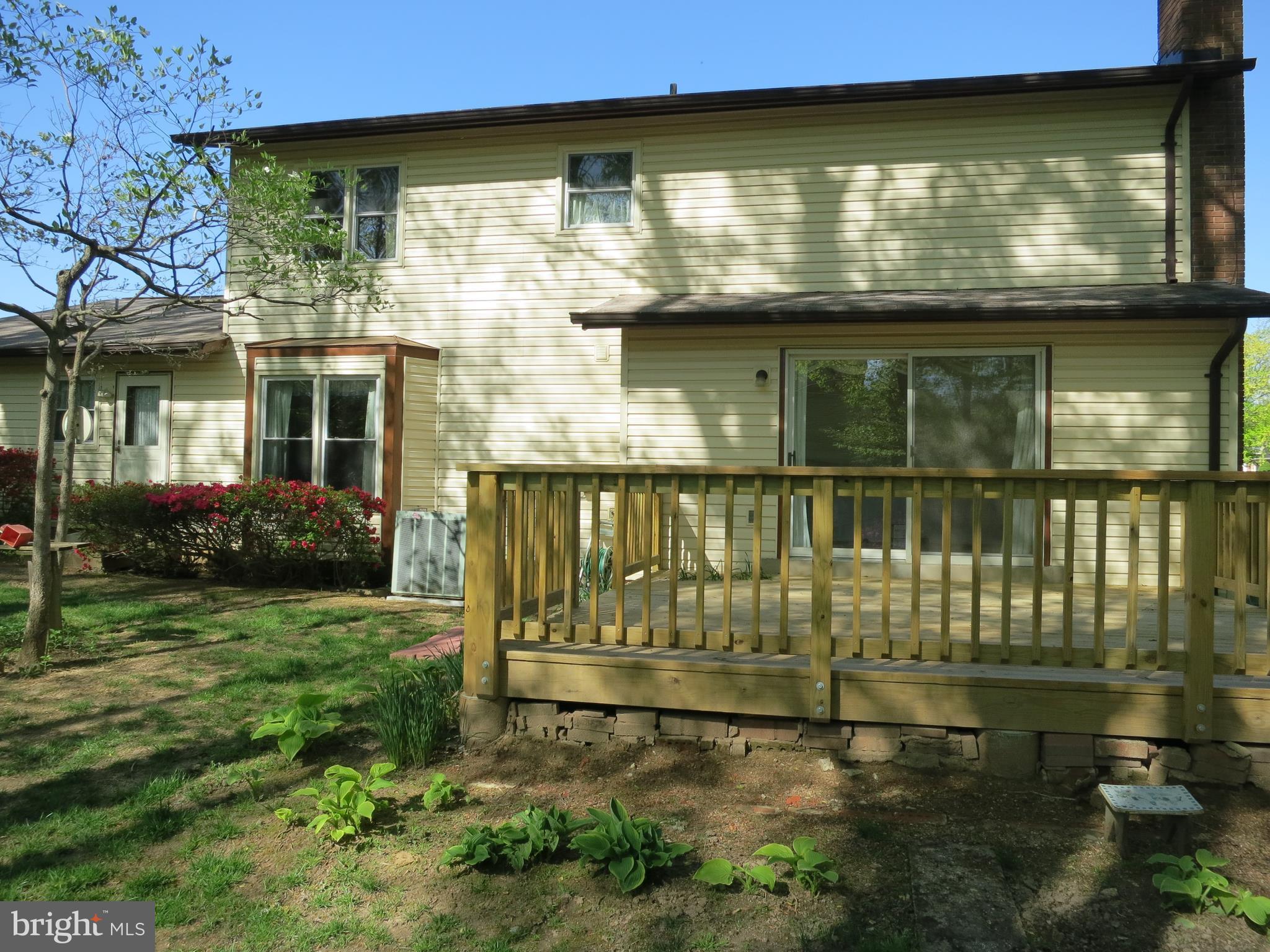9156 Rockefeller Lane Springfield, VA 22153 - Photo 29 of 30 a front view of a house with a yard