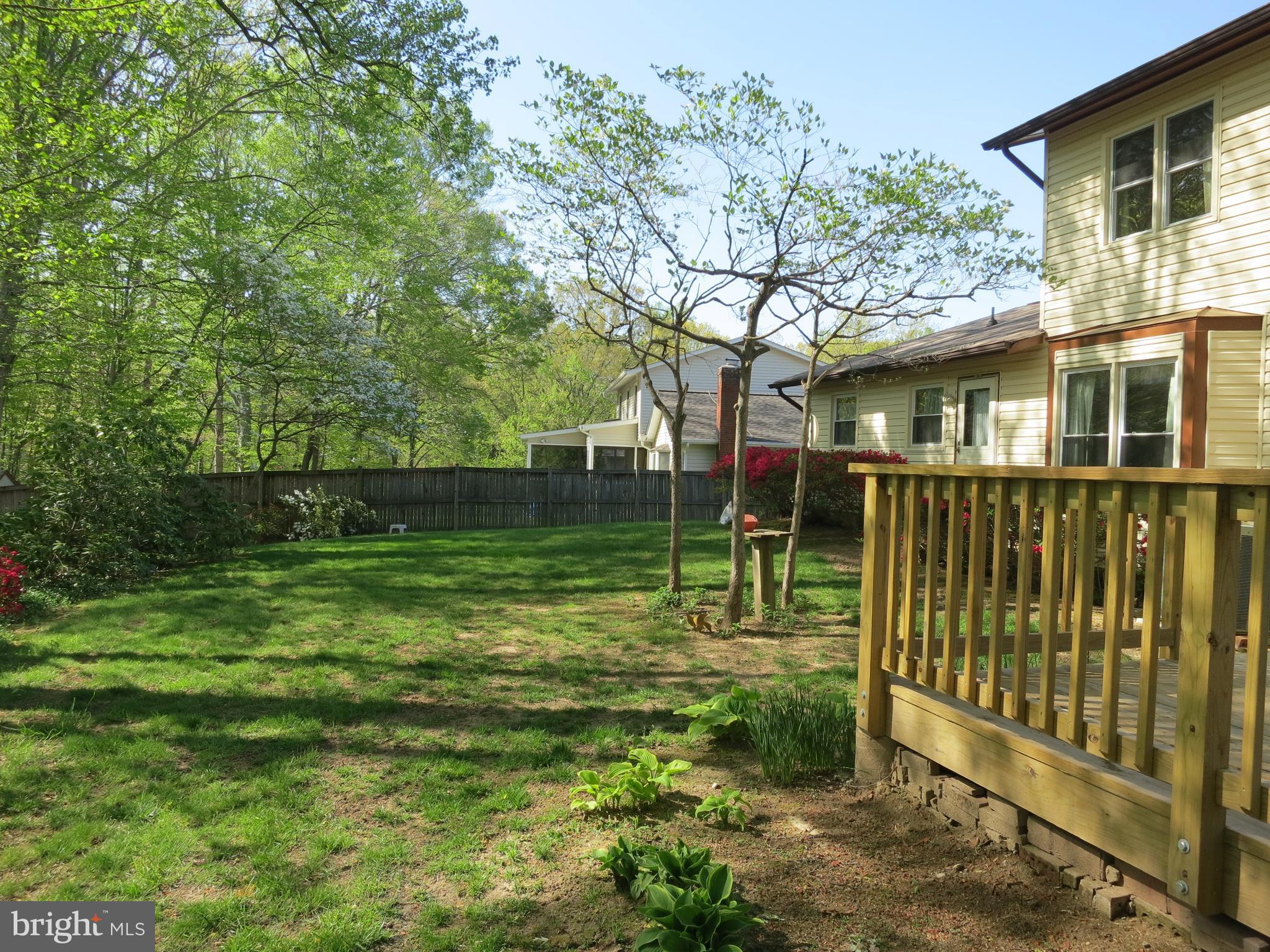 9156 Rockefeller Lane Springfield, VA 22153 - Photo 30 of 30 a view of a house with a backyard