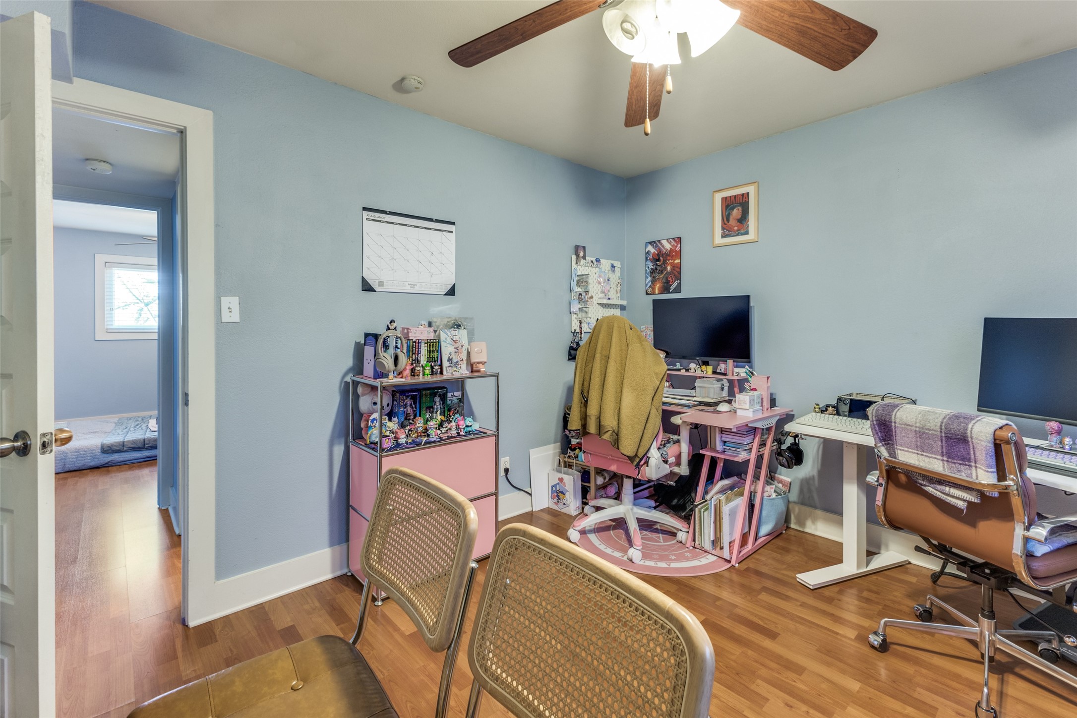 3815 Guadalupe Street, Unit 305 Austin, TX 78751 - Photo 15 of 27 a view of a workspace with furniture and a window