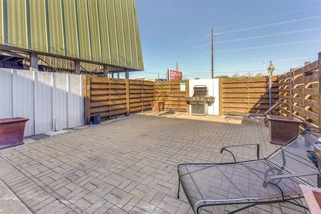 a house view with a backyard space