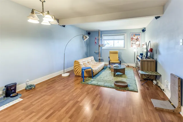 a room with furniture and a wooden floor