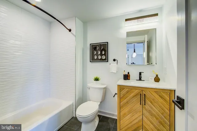 a bathroom with a sink and a bathtub