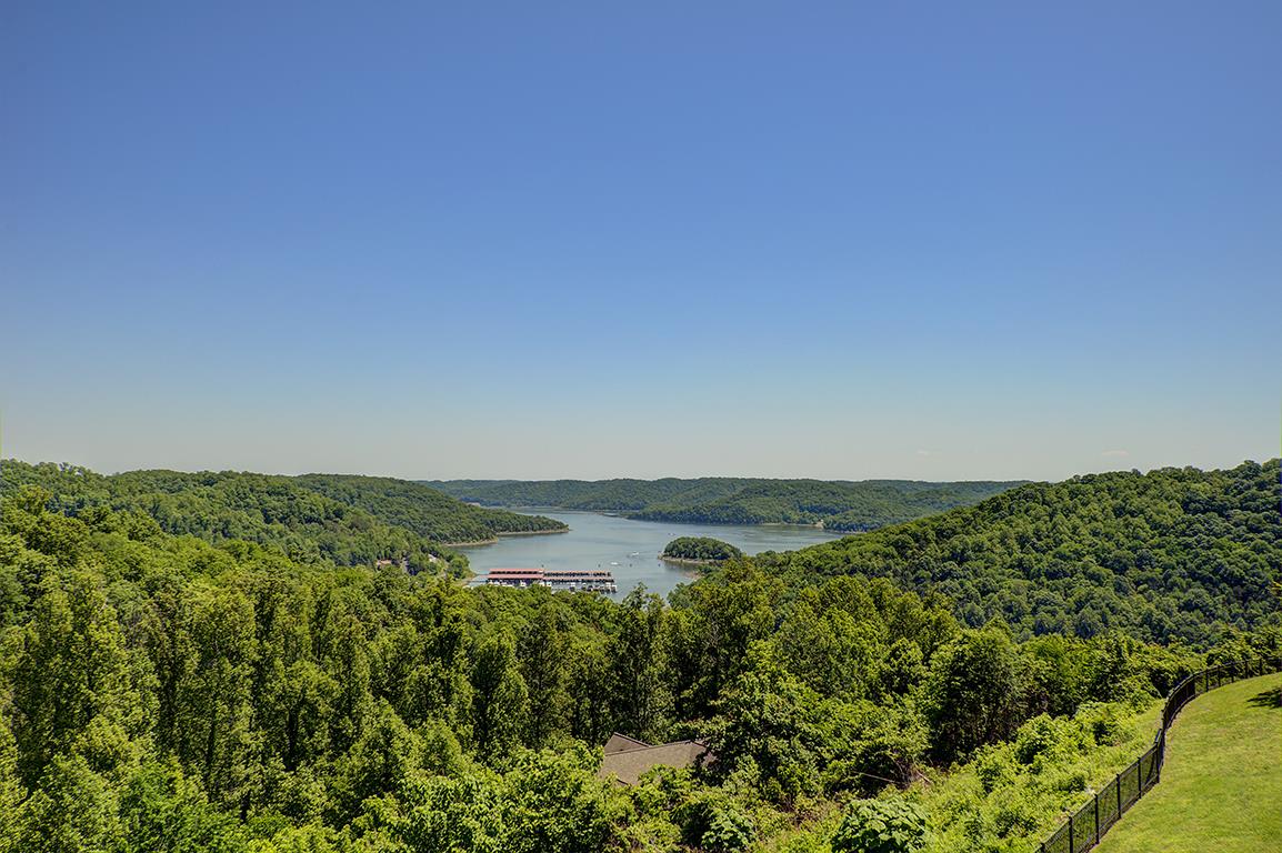 7100 Dale Ridge Road, Unit J3 Lancaster, TN 38569 - Photo 1 of 21 a view of a field with an ocean