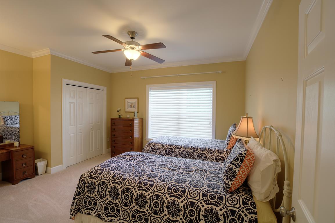 7100 Dale Ridge Road, Unit J3 Lancaster, TN 38569 - Photo 12 of 21 a bedroom with a bed and a window