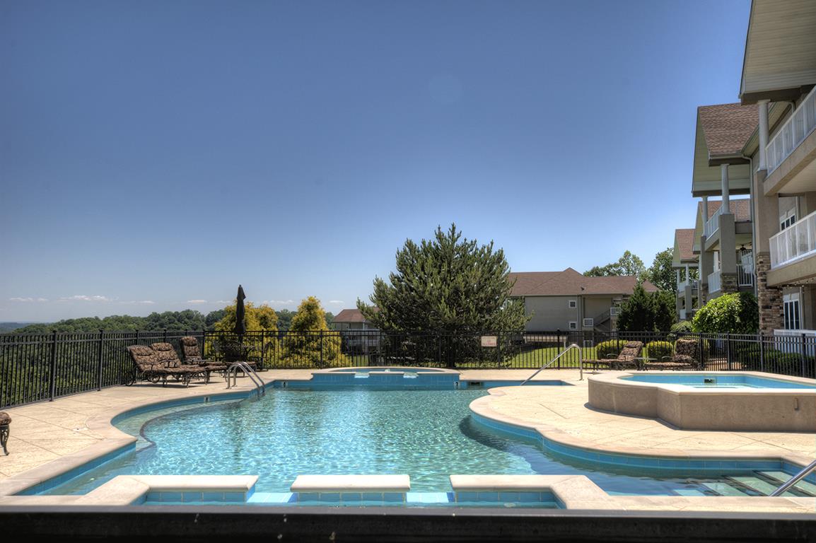 7100 Dale Ridge Road, Unit J3 Lancaster, TN 38569 - Photo 19 of 21 a view of a swimming pool with outdoor seating