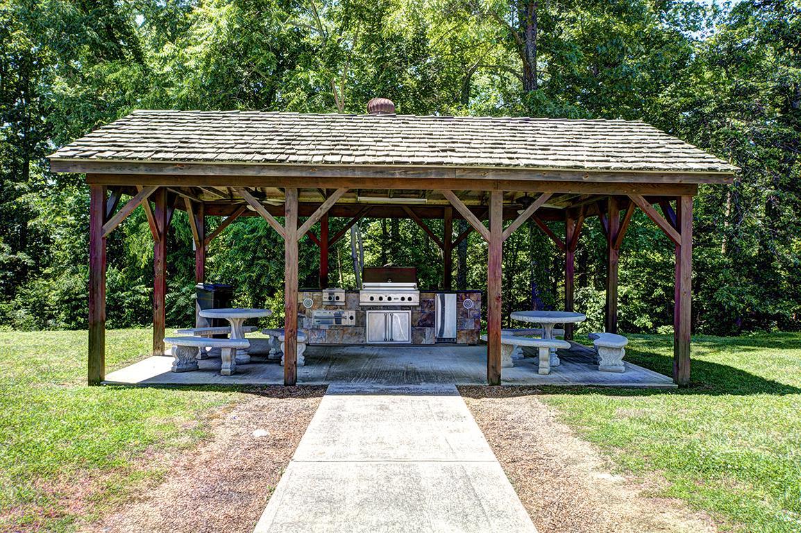 7100 Dale Ridge Road, Unit J3 Lancaster, TN 38569 - Photo 20 of 21 an outdoor view of house with outdoor seating