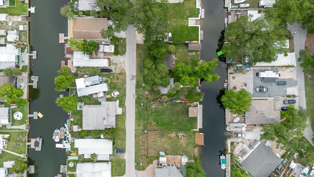 5323 Circle Drive Weeki Wachee, FL 34607 - Photo 12 of 77 an aerial view of residential houses with outdoor space
