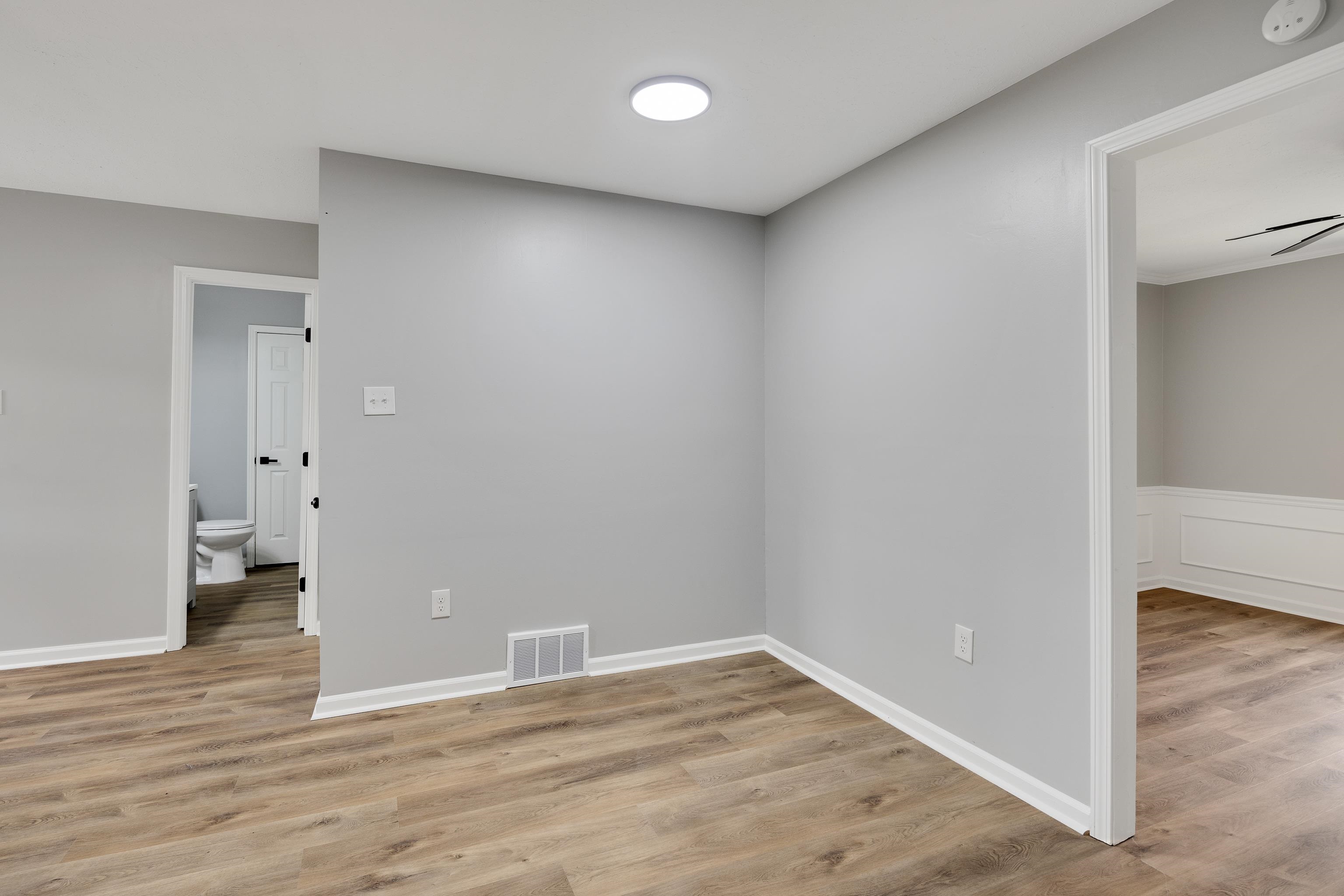 2096 Allenby Road Germantown, TN 38139 - Photo 14 of 40 wooden floor in an empty room