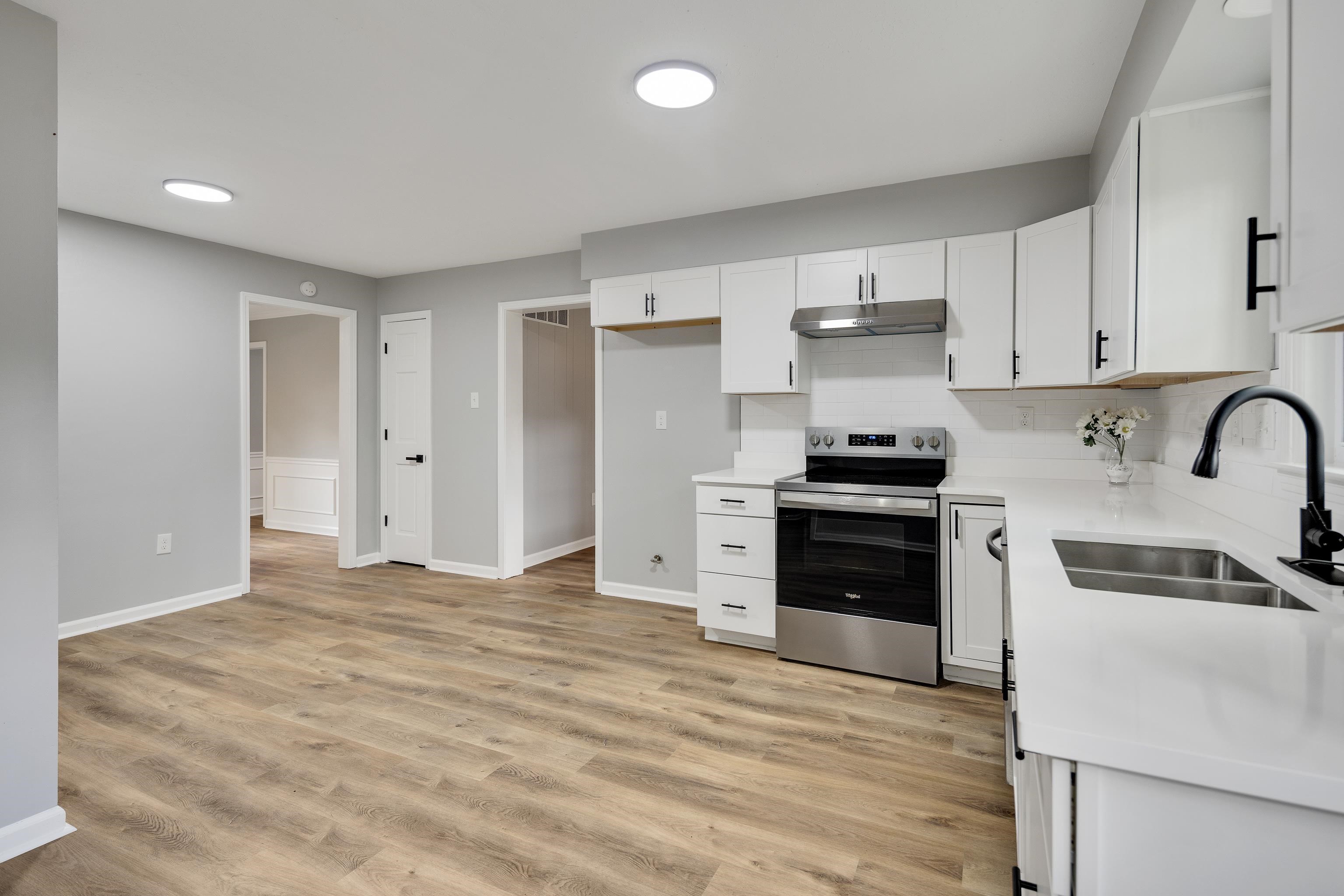 2096 Allenby Road Germantown, TN 38139 - Photo 17 of 40 a kitchen with stainless steel appliances granite countertop a stove and a refrigerator