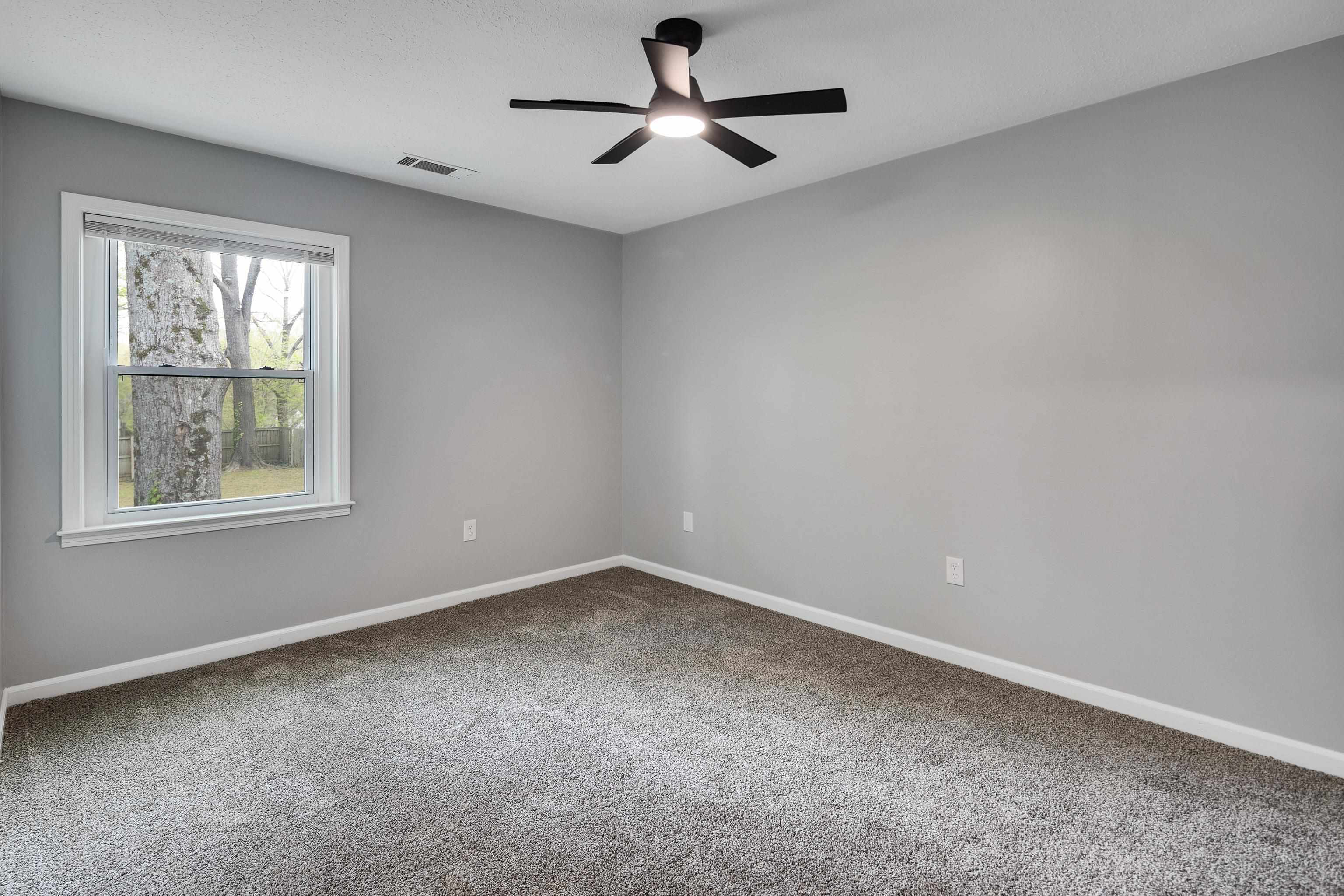 2096 Allenby Road Germantown, TN 38139 - Photo 21 of 40 a view of an empty room with a window
