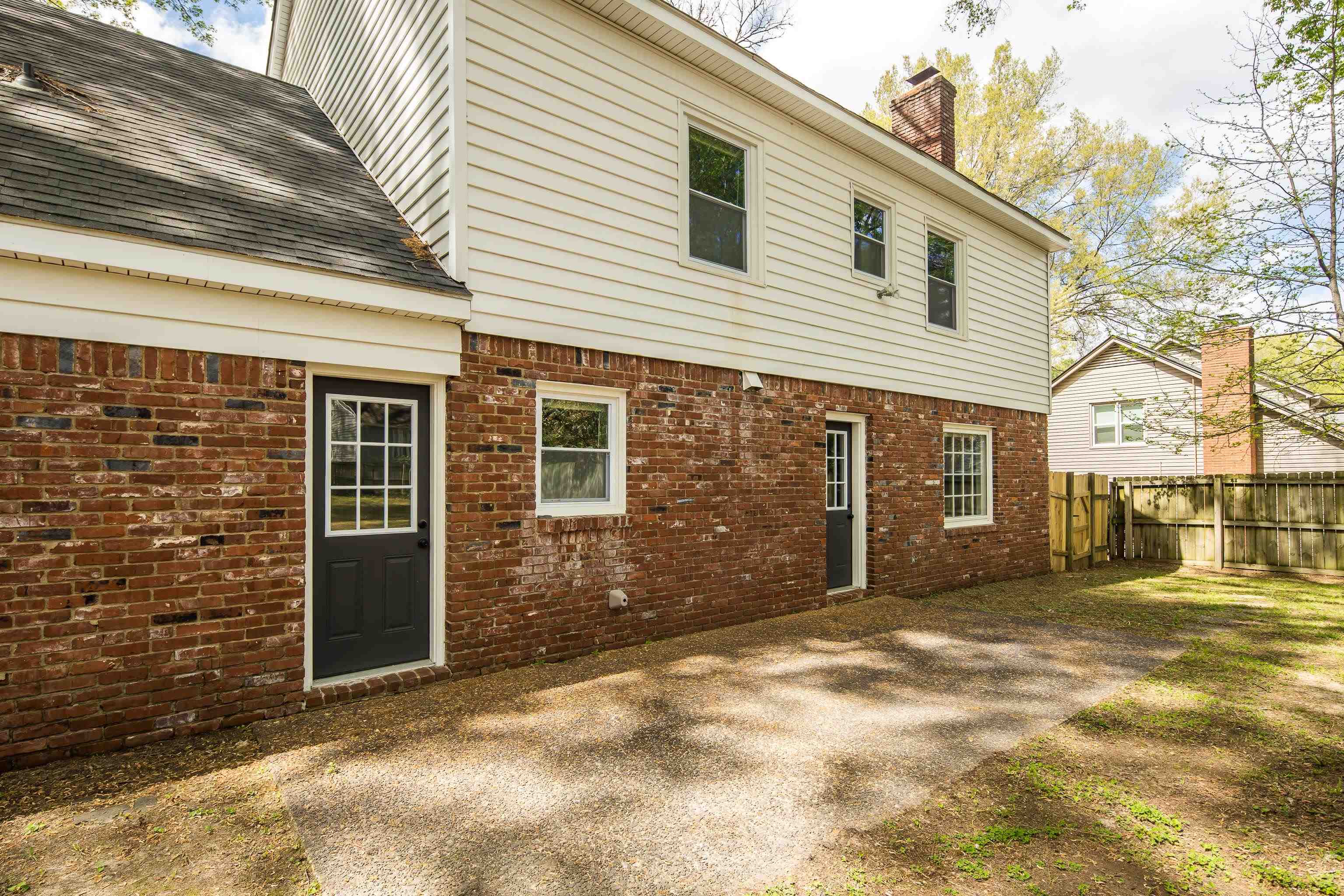 2096 Allenby Road Germantown, TN 38139 - Photo 35 of 40 a view of a backyard with a large tree