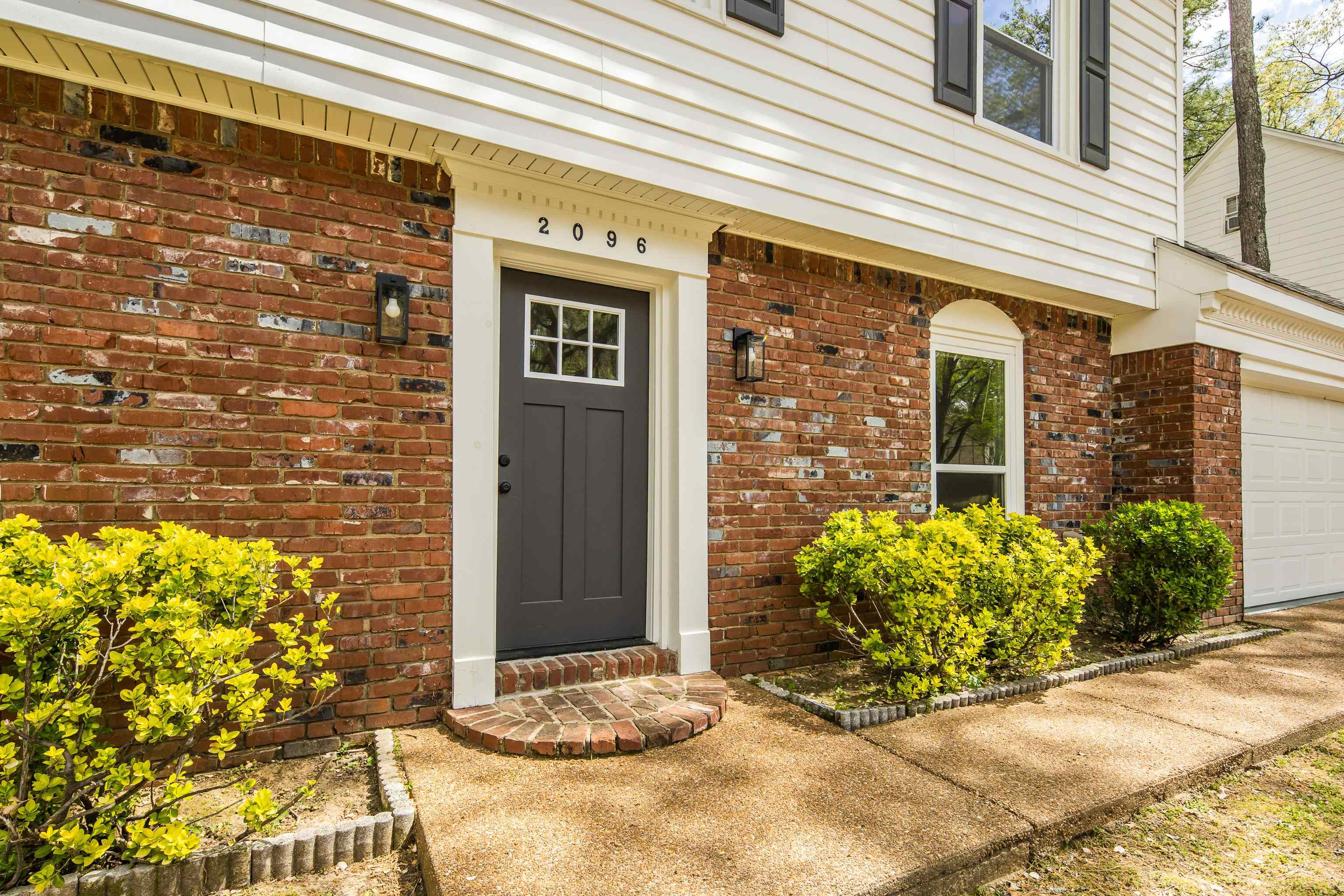 2096 Allenby Road Germantown, TN 38139 - Photo 5 of 40 a view of a potted plant in front of a house