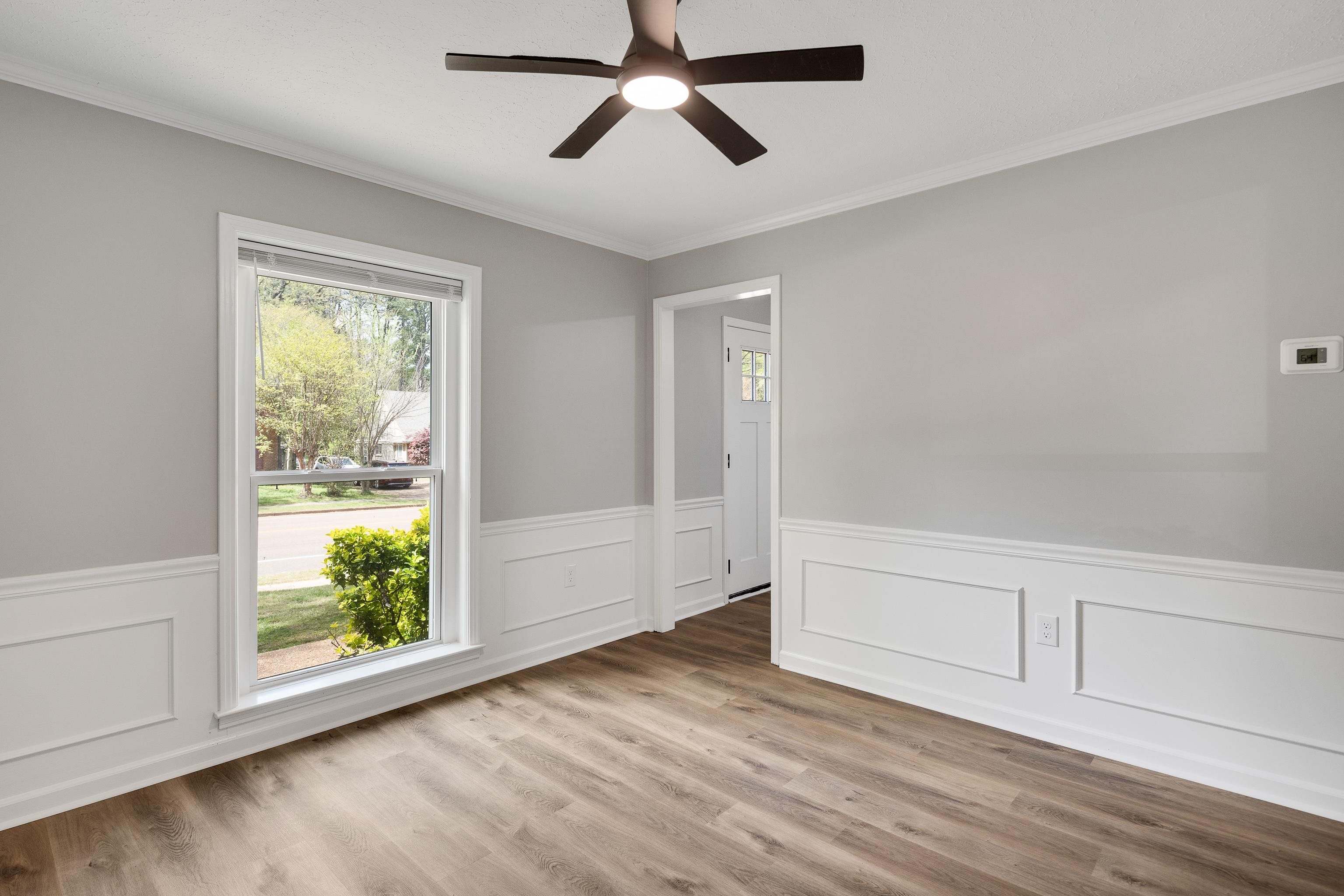 2096 Allenby Road Germantown, TN 38139 - Photo 10 of 40 a view of empty room with wooden floor and fan