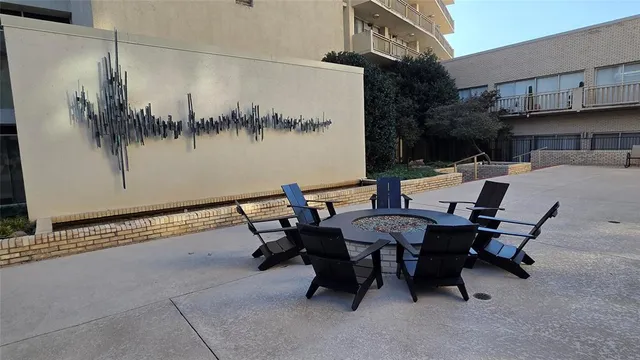 a view of a tables and chairs in patio