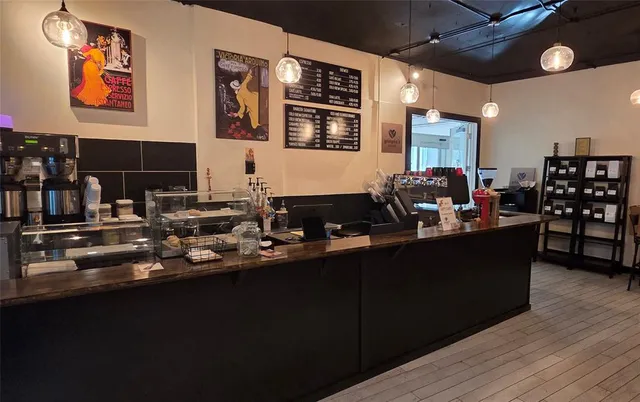 a view of swimming pool with outdoor seating