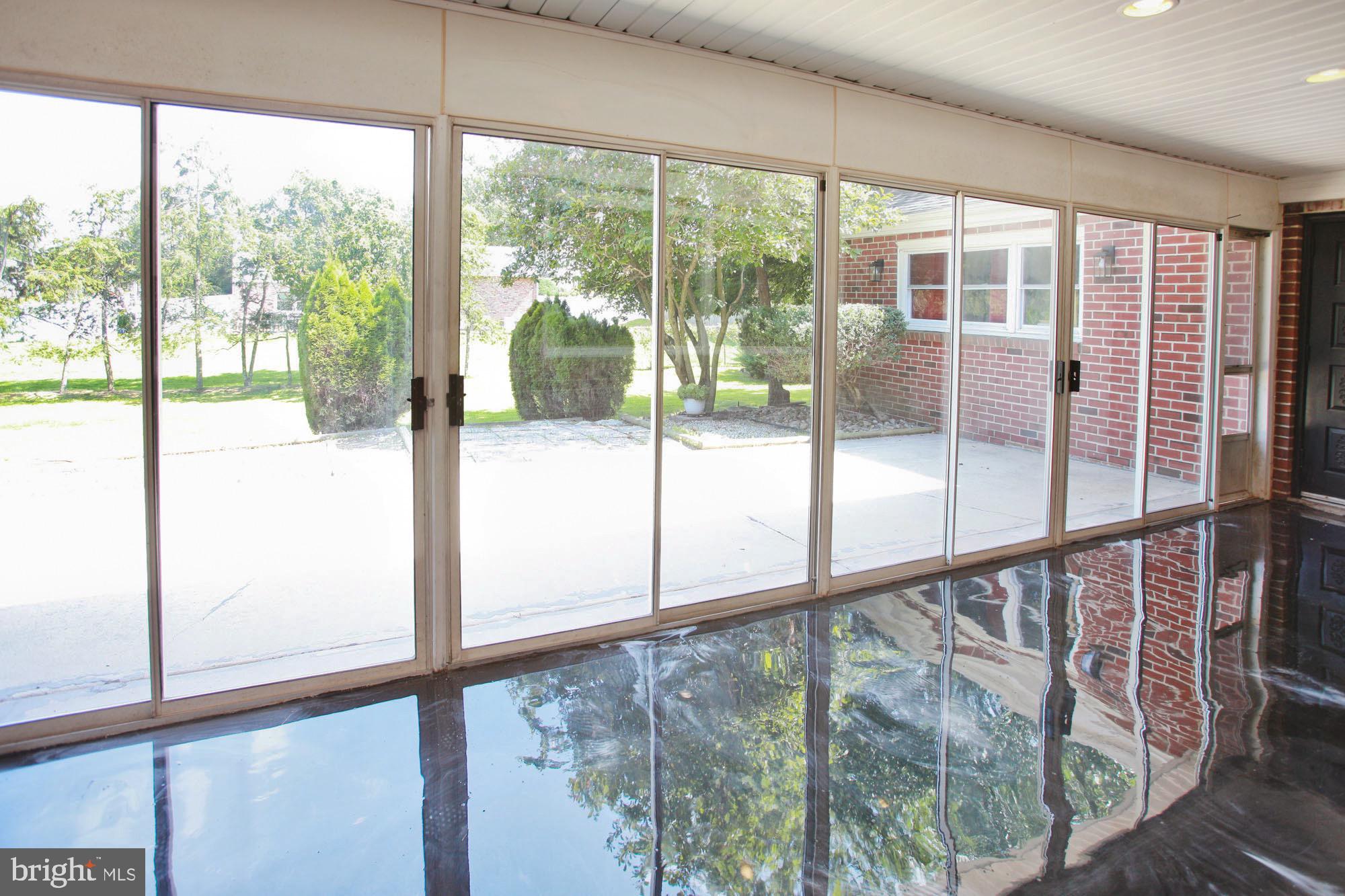 3945 Blue Bird Road Huntingdon Valley, PA 19006 - Photo 30 of 34 Sunroom at rear of house