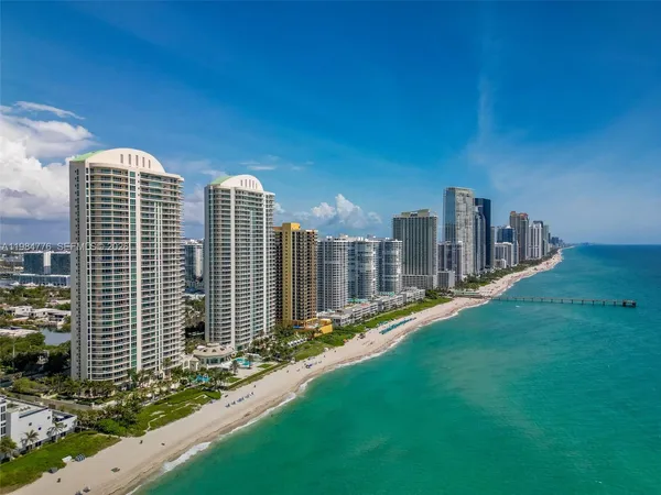 a view of a city with tall buildings
