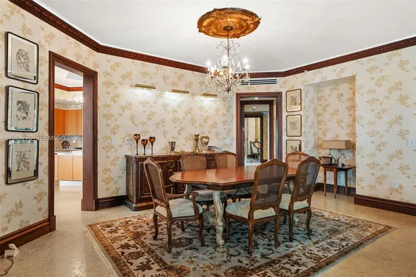 a large kitchen with stainless steel appliances granite countertop a sink and counter space
