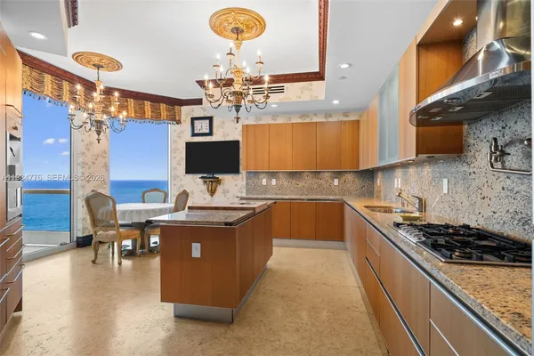 a view of an empty room with a ocean view
