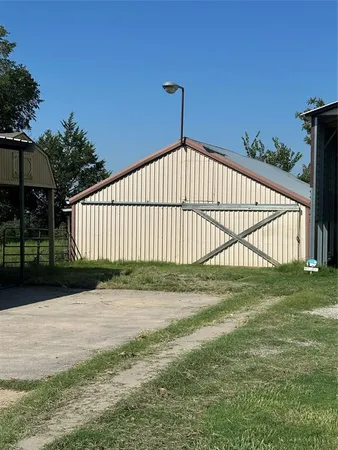 a view of a backyard with a garden
