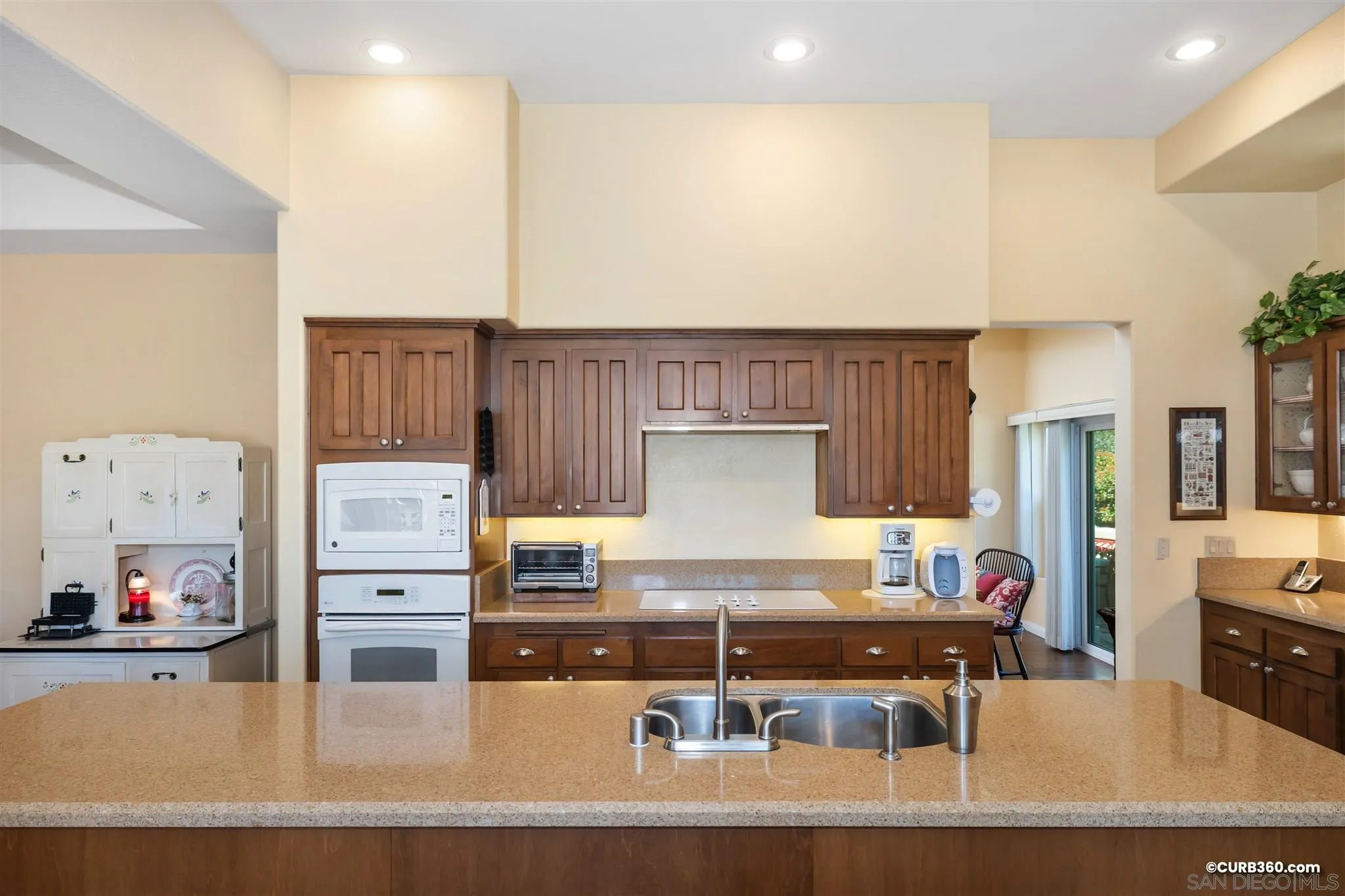 2520 Tompau Place Alpine, CA 91901 - Photo 12 of 41 a living room with furniture and a flat screen tv