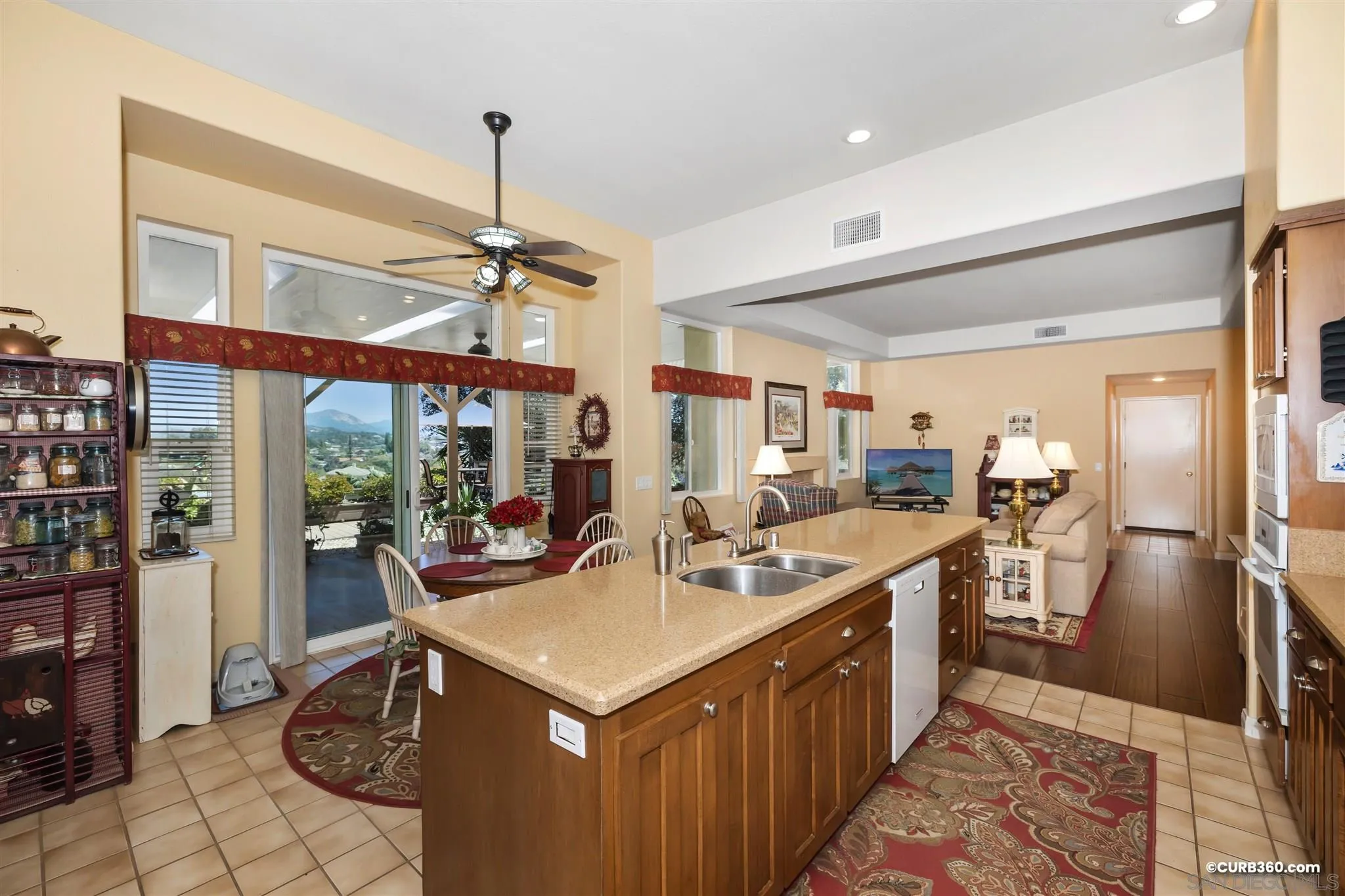 2520 Tompau Place Alpine, CA 91901 - Photo 13 of 41 a kitchen with a sink stove and refrigerator