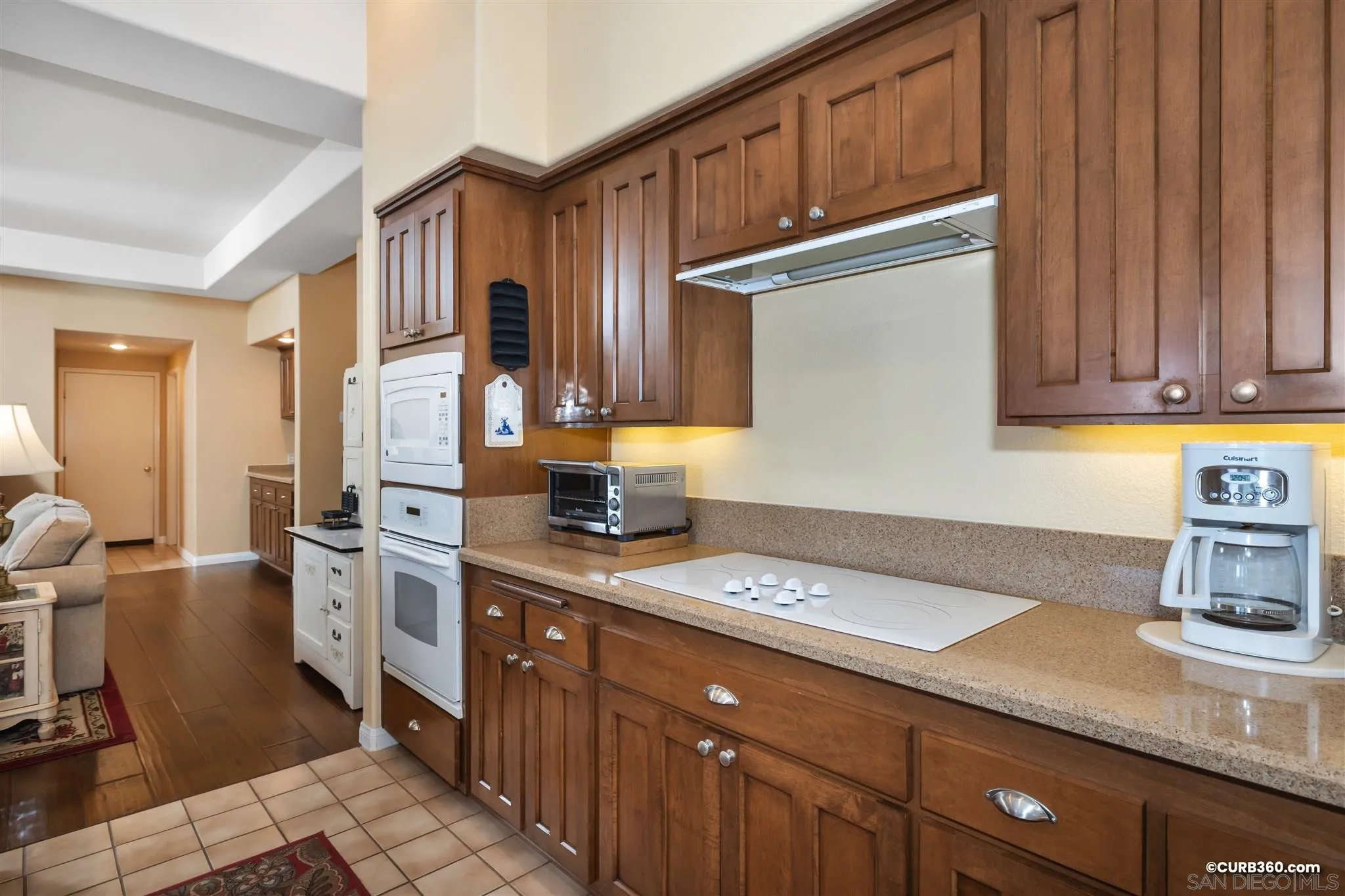 2520 Tompau Place Alpine, CA 91901 - Photo 14 of 41 a kitchen with stainless steel appliances granite countertop a sink stove and cabinets