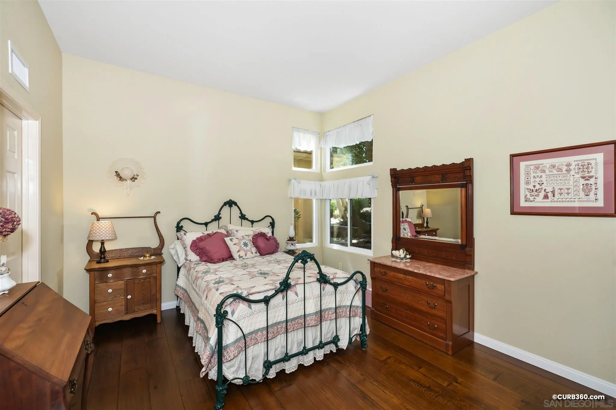 2520 Tompau Place Alpine, CA 91901 - Photo 16 of 41 a bedroom with furniture and a bed