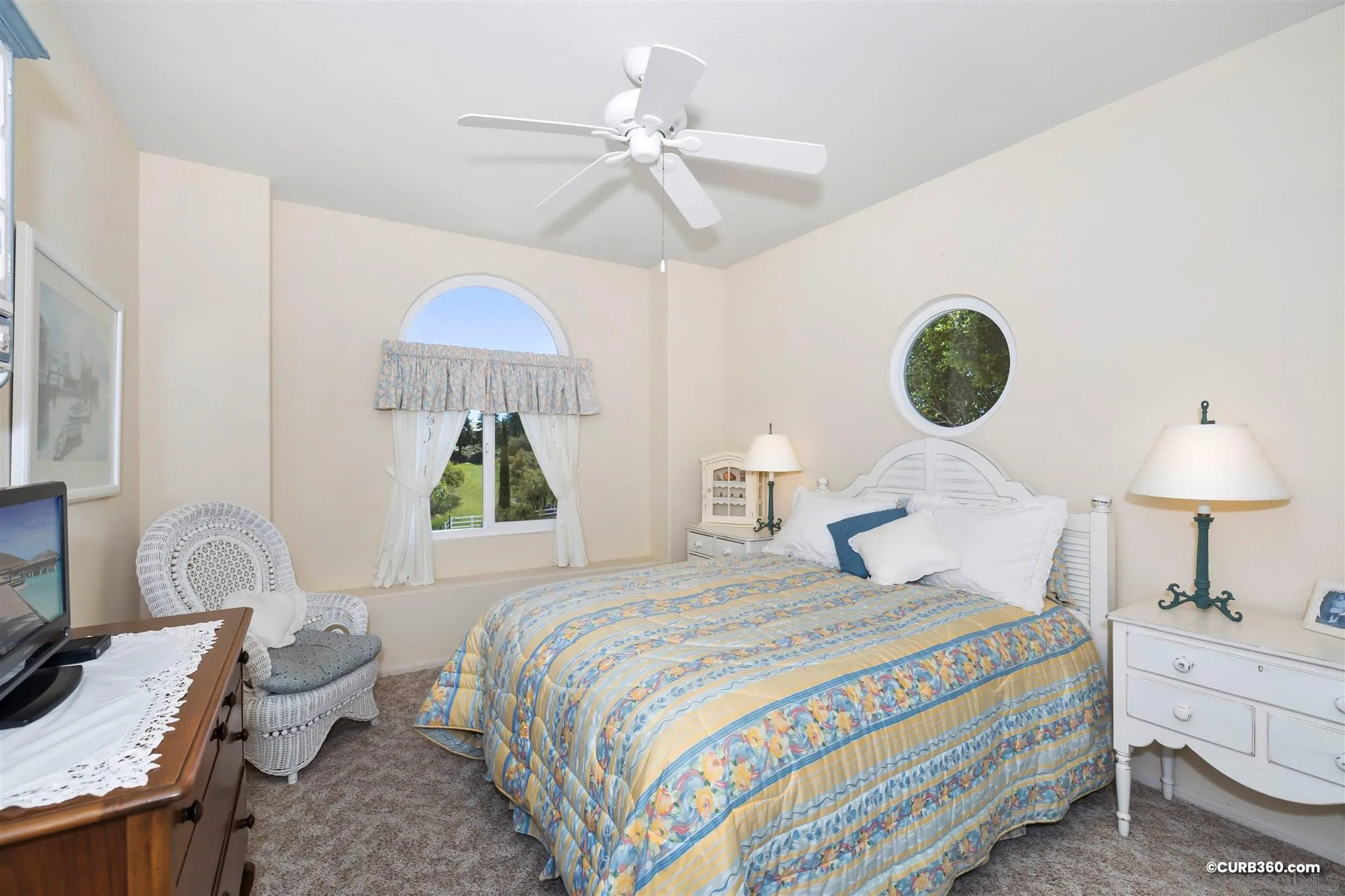 2520 Tompau Place Alpine, CA 91901 - Photo 19 of 41 a bedroom with a bed and a chandelier