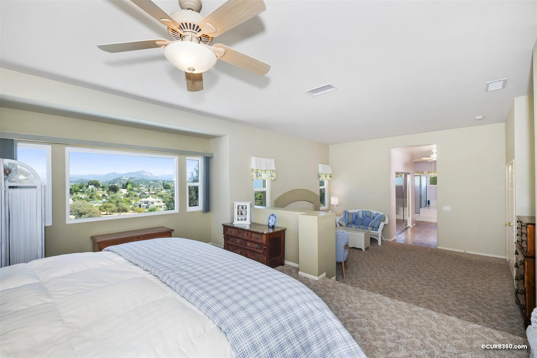 2520 Tompau Place Alpine, CA 91901 - Photo 24 of 41 a bed room with a bed and a large window