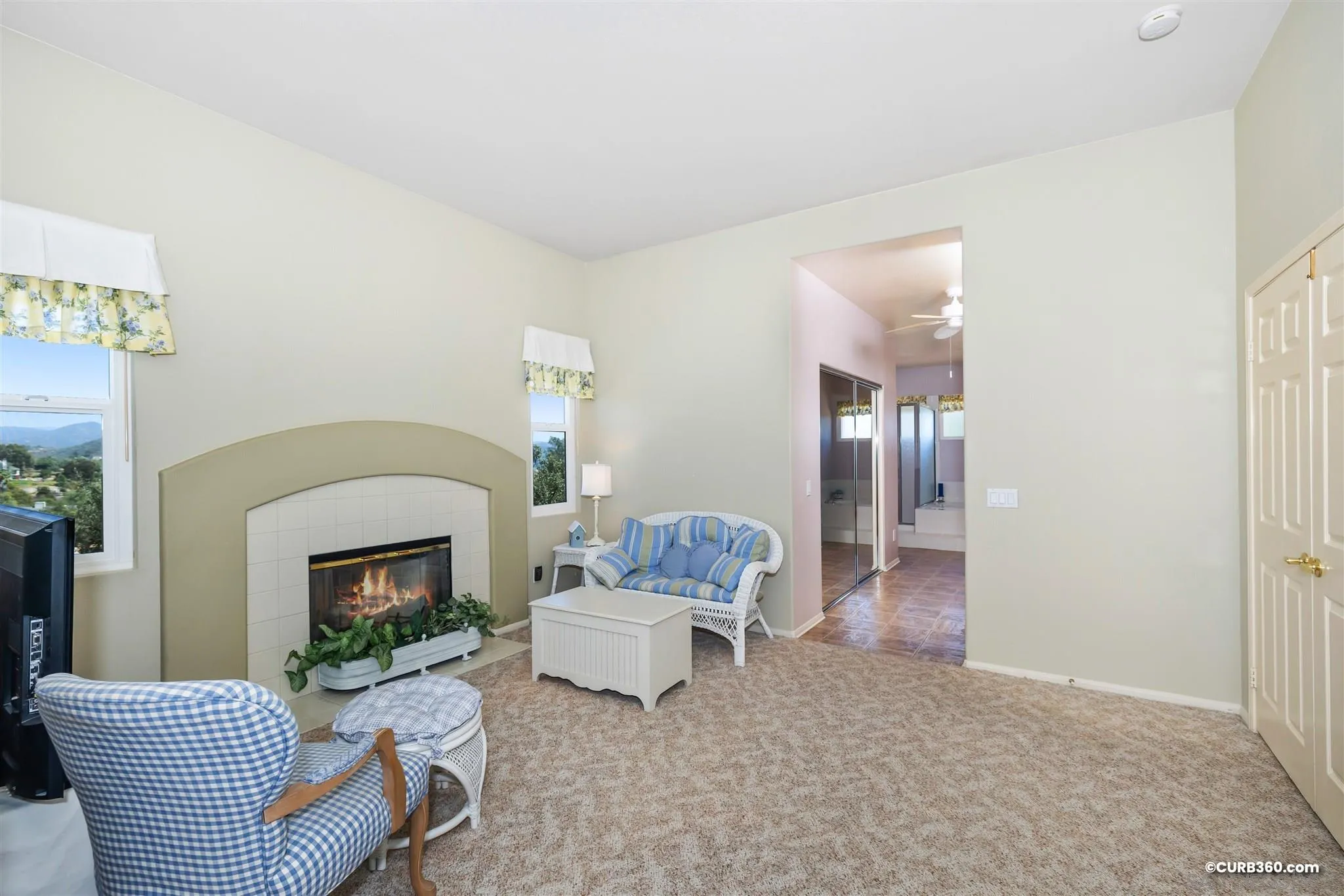 2520 Tompau Place Alpine, CA 91901 - Photo 25 of 41 a living room with furniture and a fireplace