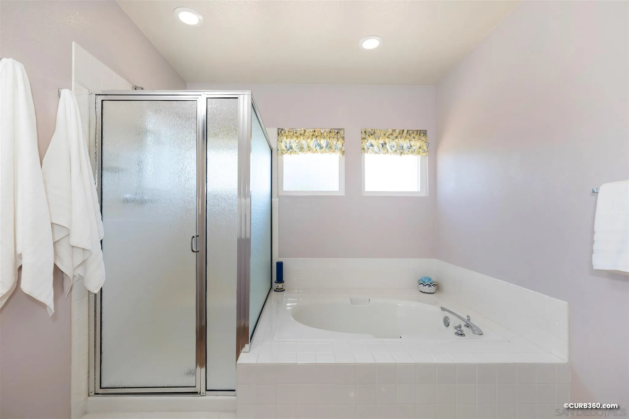 2520 Tompau Place Alpine, CA 91901 - Photo 26 of 41 a bathroom with a bathtub and a shower