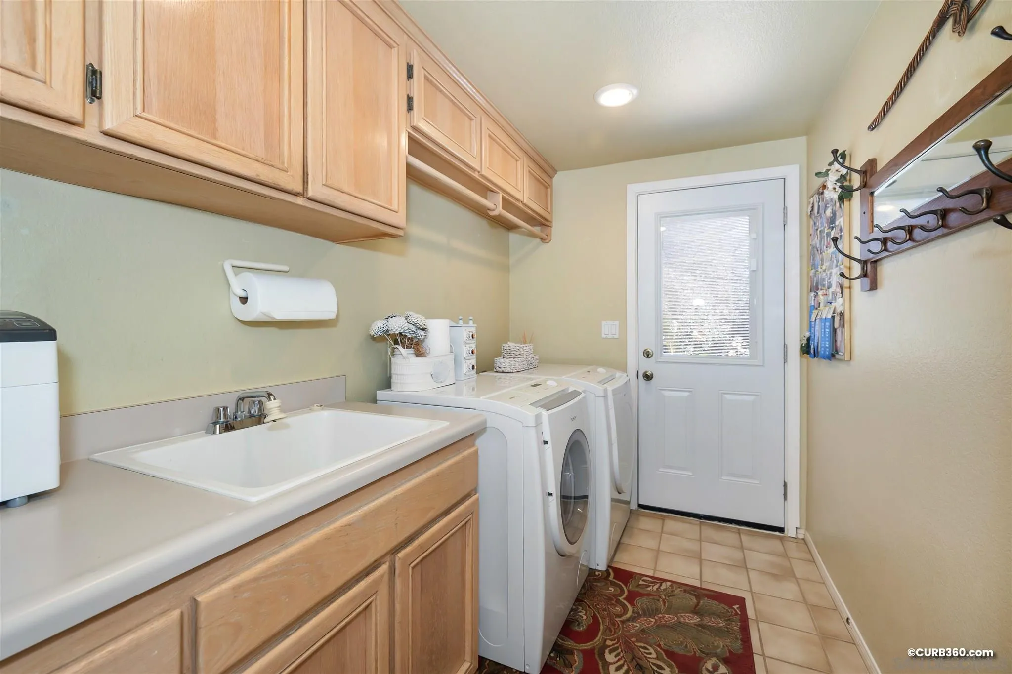 2520 Tompau Place Alpine, CA 91901 - Photo 28 of 41 a bathroom with a sink a toilet and shower