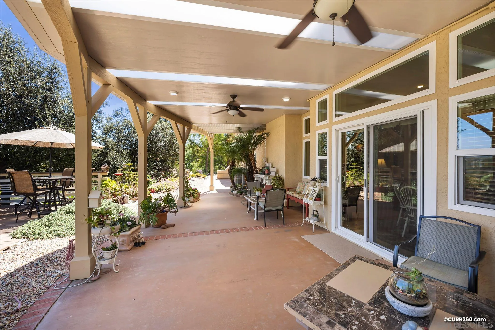 2520 Tompau Place Alpine, CA 91901 - Photo 29 of 41 a living room with furniture and a potted plant