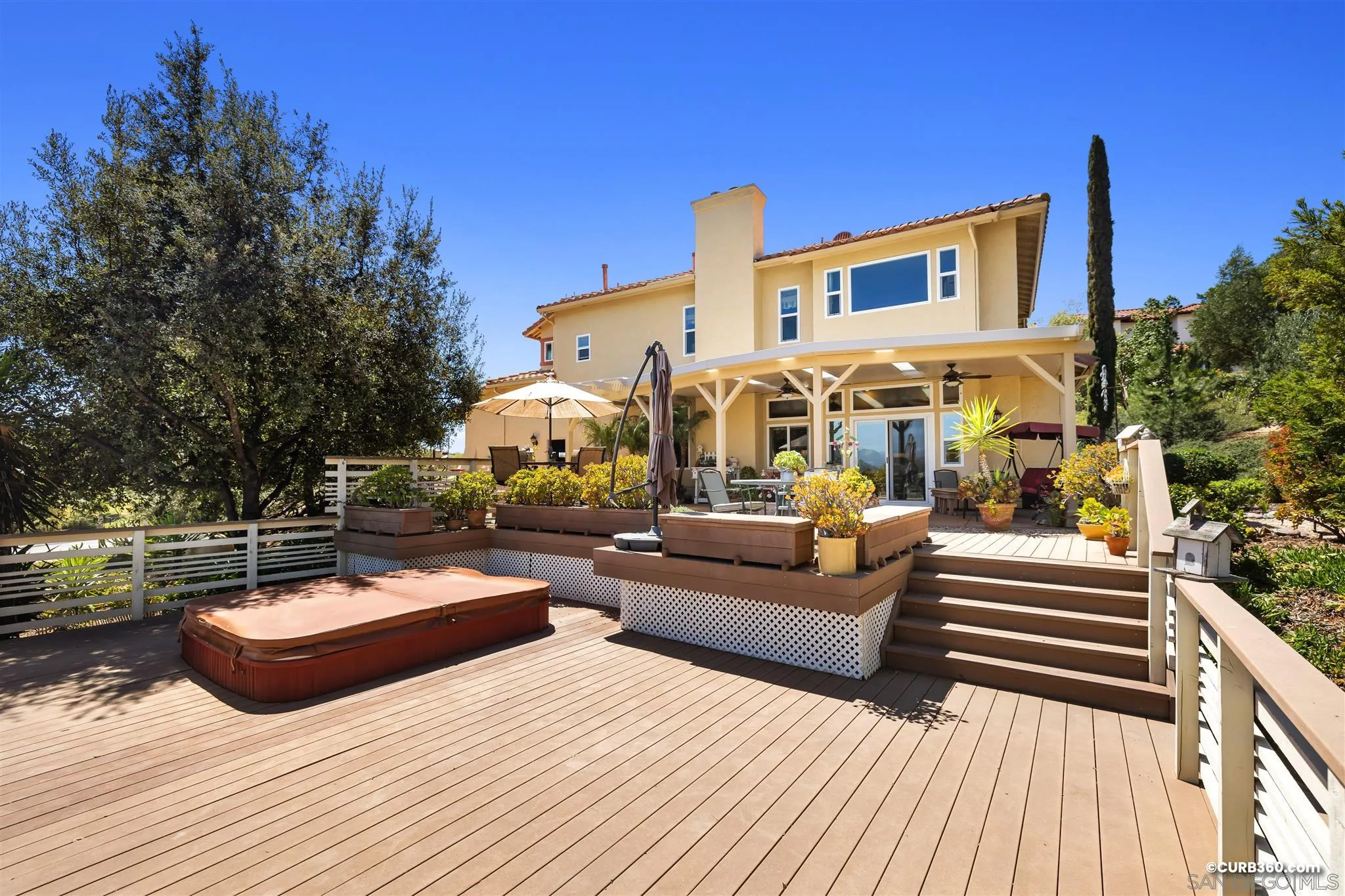 2520 Tompau Place Alpine, CA 91901 - Photo 31 of 41 a outdoor space with patio the couches and a potted plant on the wooden floor