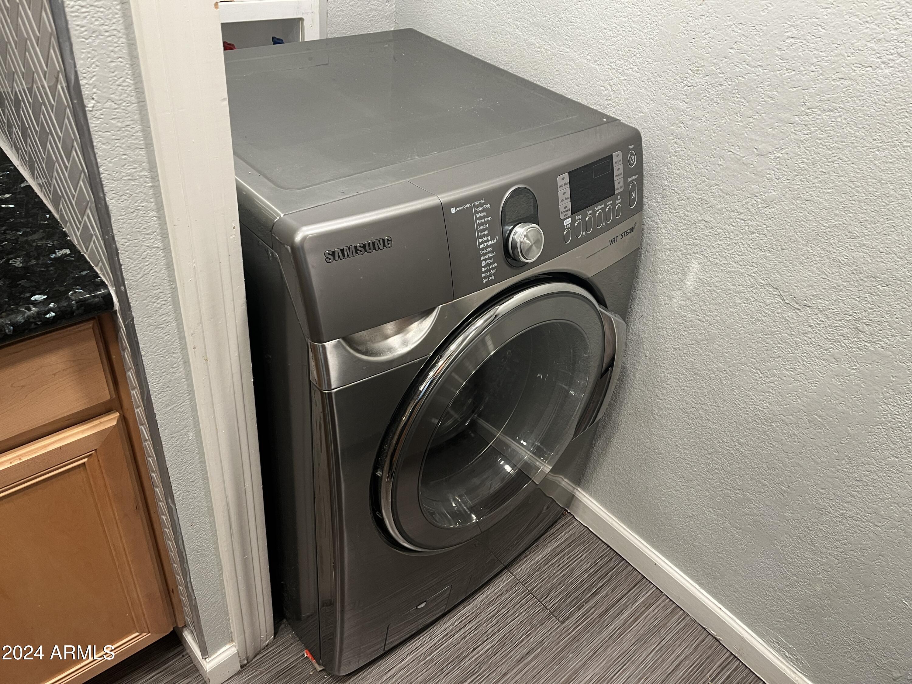 740 West Elm Street, Unit 110 Phoenix, AZ 85013 - Photo 7 of 22 a utility room with dryer and washer