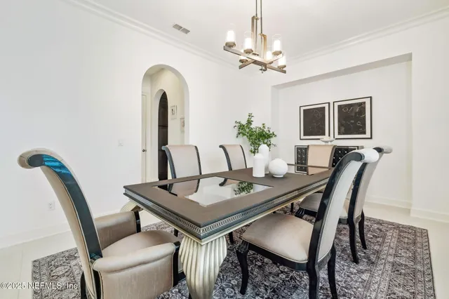 a kitchen with a sink and a stove top oven