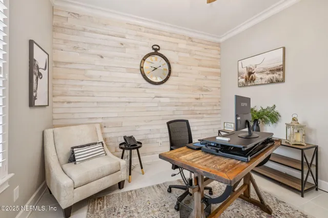 a aerial view of a house with a big yard