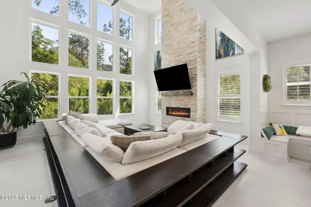 a view of a park with large trees