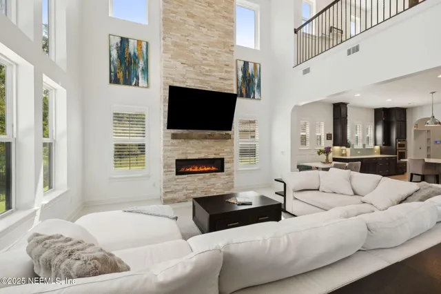 a view of a swimming pool with a table and chairs